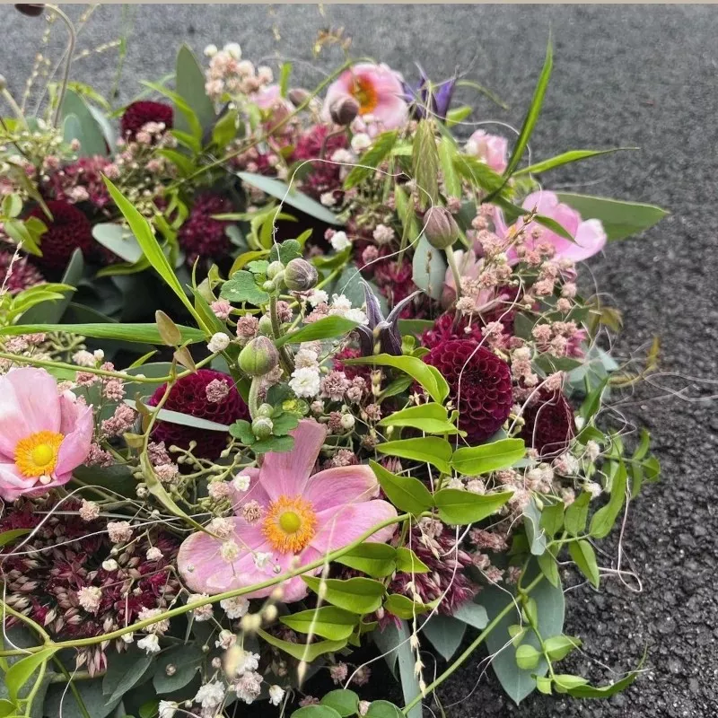 Tröstender Blumenkranz