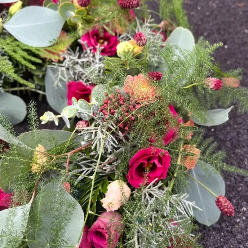 Tröstender Blumenkranz