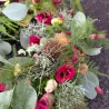 Tröstender Blumenkranz